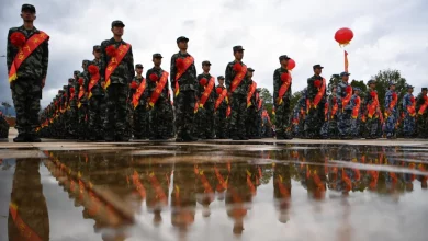 Понад 500 новобранців Народно-визвольної армії (НВАК) на фото 15 вересня 2020 року в Куньміні, провінція Юньнань. Бригади добровольців Китаю підтримують НВАК. Лю Раньян/China News Service/Getty Images